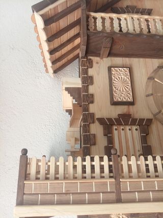 Casa reloj artesanal