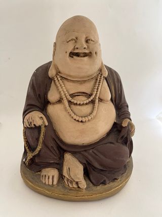 Buda da felicidade em gesso
