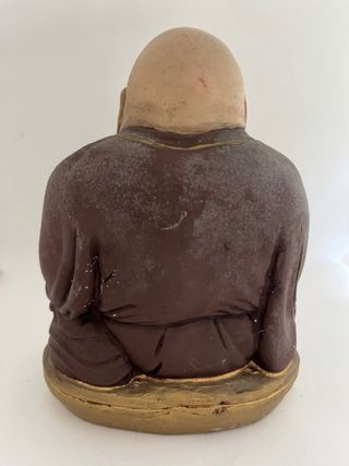 Buda da felicidade em gesso