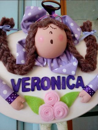 Quadretto con bambola