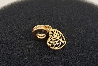 Charm Árbol de la Vida dorado.
