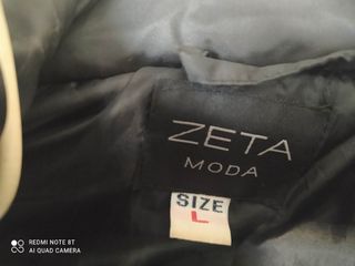 Plumas negro Talla L. Muy elegante