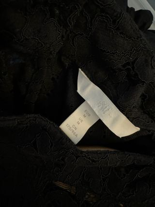 Blusa de encaje negro