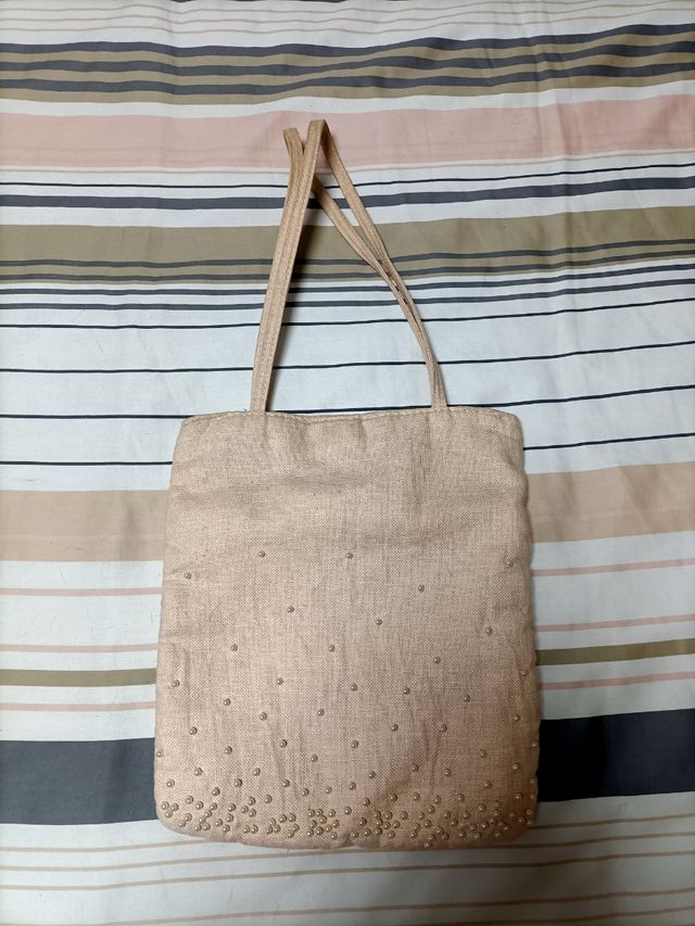 Bolso de mano rosa palo