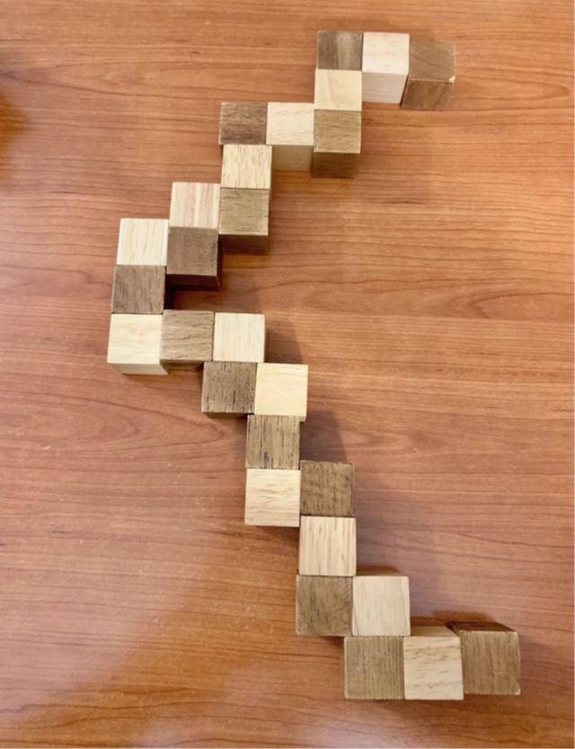 Rompicapo serpente cubo legno