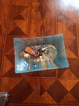 Piatto vetro, svuotatasche