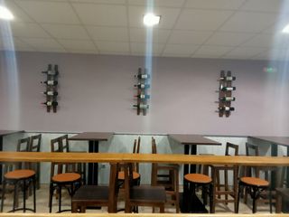 Expositor botellero de pared