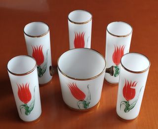 Cinco vasos de tubo y cubitera