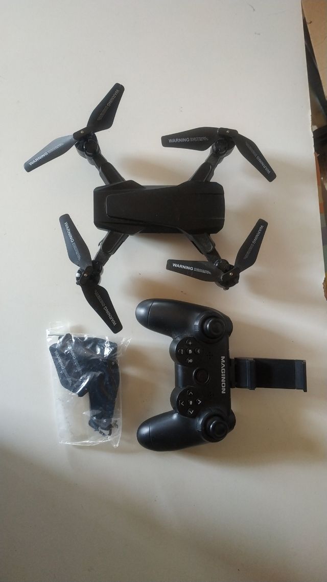 Dron con mando - batería floja