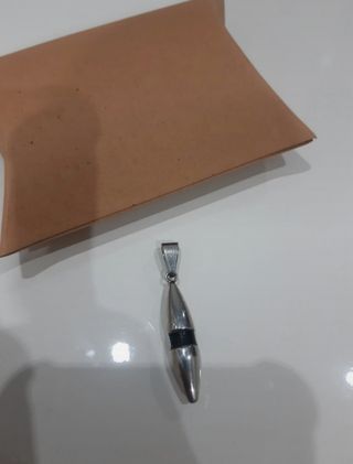 Colgante de acero, en forma de bala