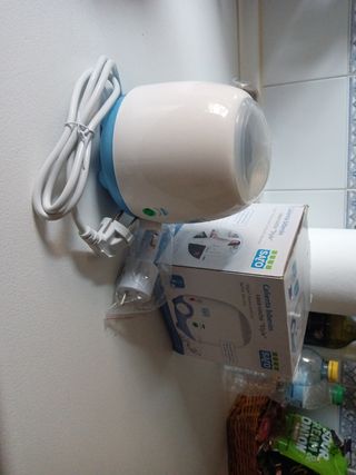 € Calienta biberones y trona viaje