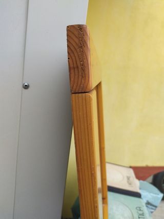 Specchio con bordatura in legno