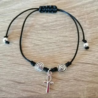 Conjunto de cruz egigcia con espirales