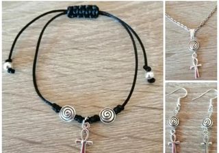 Conjunto de cruz egigcia con espirales