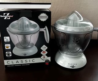 exprimidor eléctrico