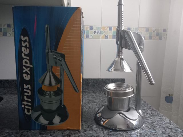 EXPRIMIDOR DE PALANCA DE ACERO INOXIDABLE