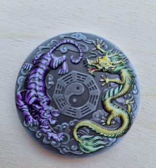 Moneda Tigre y Dragon 