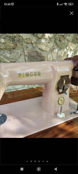 Máquina de coser singer con mueble