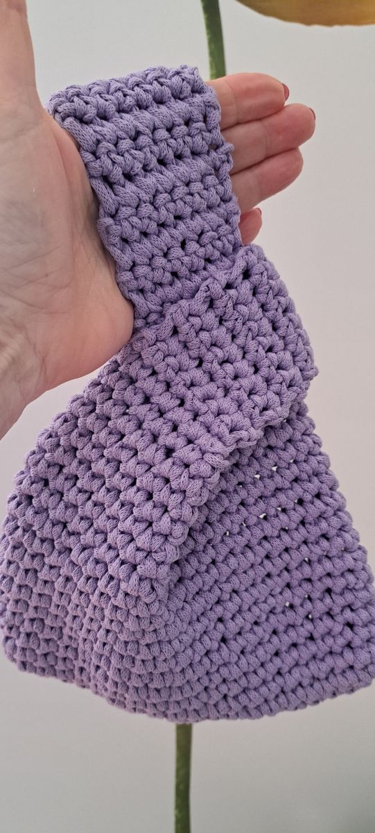 Borsetta giapponese da polso lavorata a mano ✍️ 