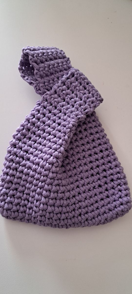 Borsetta giapponese da polso lavorata a mano ✍️ 