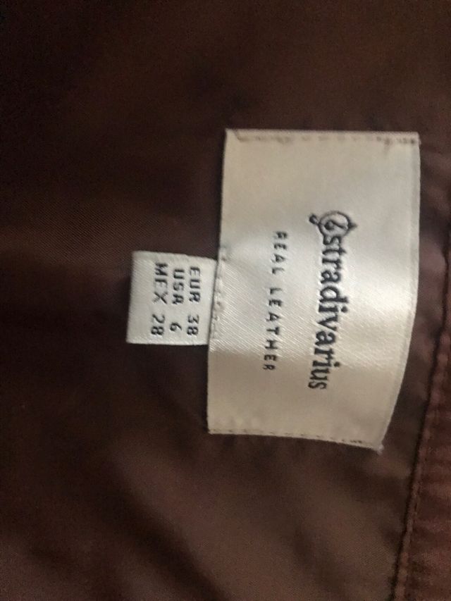 Faldilla de ante con botones delanteros