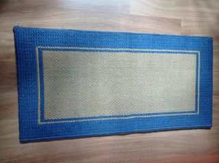 Alfombra pie de cama
