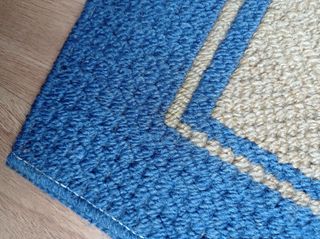 Alfombra pie de cama