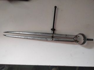 Compás manual.