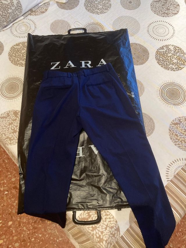 Pantalón traje azul t.36 chico