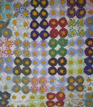 Edredón vintage de flores de tela