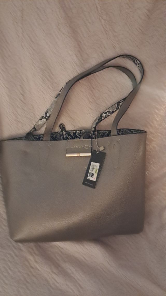 Bonito doble bolso nuevo