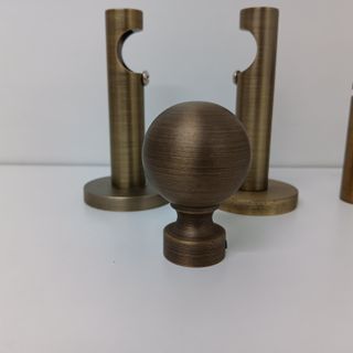 2 Soportes cortinas + 2 terminales metal 20 mm.