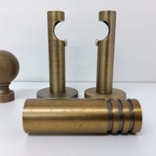 2 Soportes cortinas + 2 terminales metal 20 mm.