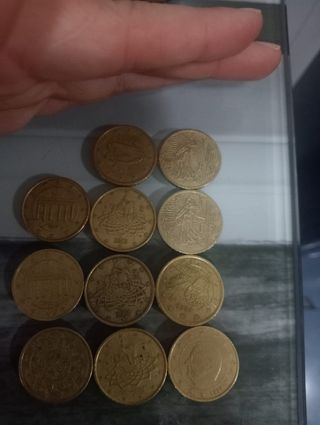 Monedas de 50 céntimos de diferentes sitios