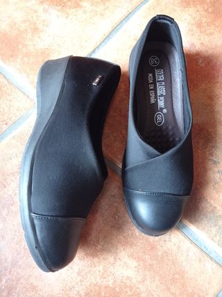 Zapatos negros de neopreno y piel