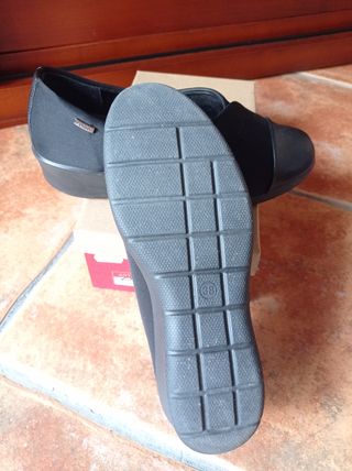Zapatos negros de neopreno y piel