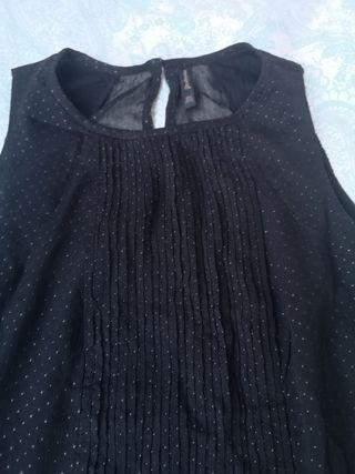 Blusa negra brillos. Talla S