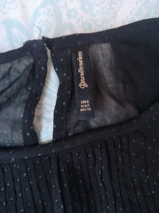 Blusa negra brillos. Talla S