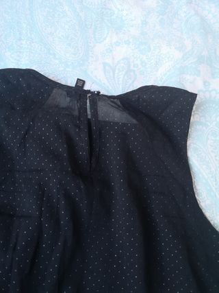Blusa negra brillos. Talla S