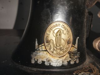 Maquina de coser singer antigua