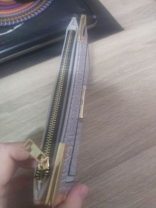 Cartera monedero River Island.