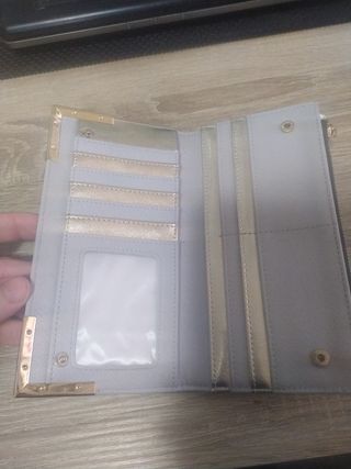Cartera monedero River Island.