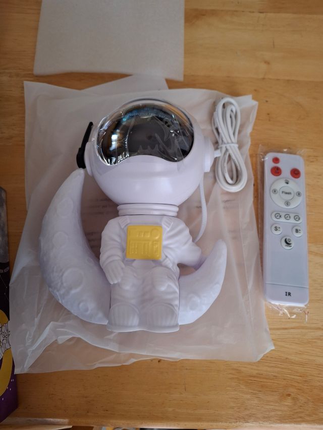 Proyector astronauta estrellas