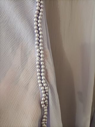 Bata con perlas morada