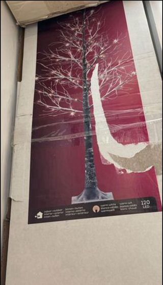 Albero di Natale di rami e luci