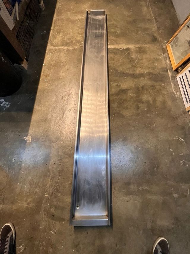 Bandeja inoxidable larga