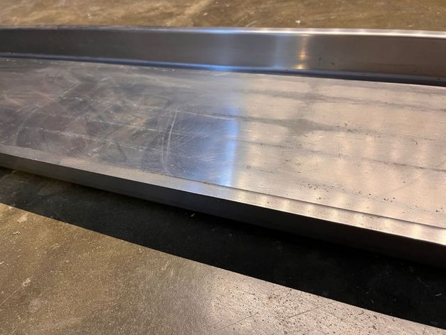 Bandeja inoxidable larga