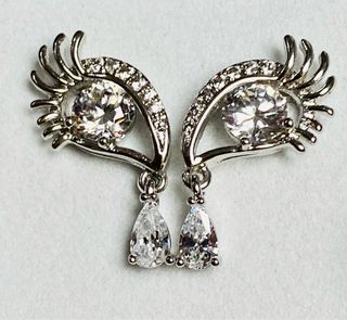 Pendientes surrealistas de ojos en plata ley 925