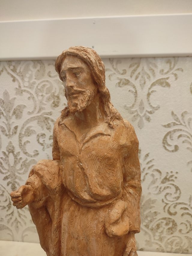 Escultura de jesucristo con borrego