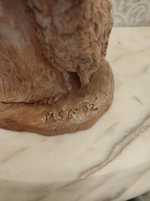 Escultura de jesucristo con borrego